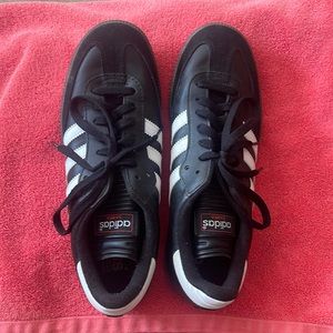 Adidas Samba black sneakers with white adidas stripes